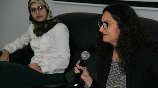 Two women at the conference