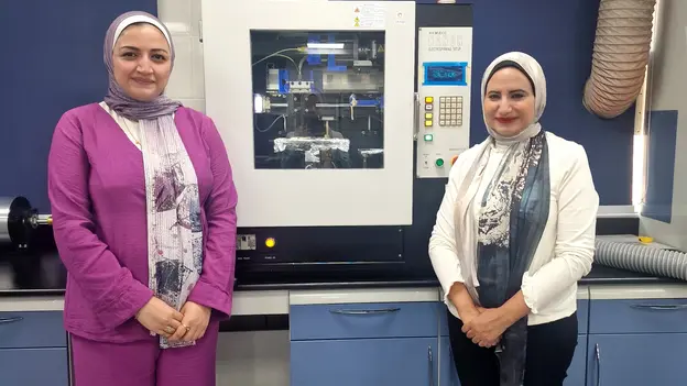 AGYA Alumna Maha Nasr with colleague at laboratory; Healing Wounds Smarter Project 1