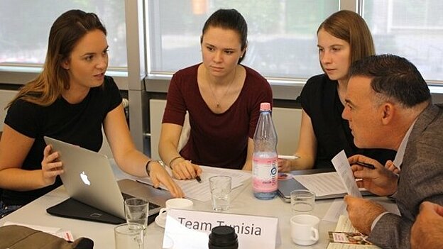 Participants discussing during the summer school
