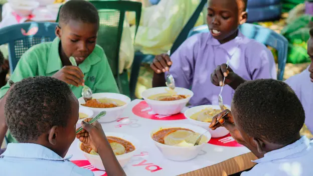 School children enjoy the school meals made from biofortified crops