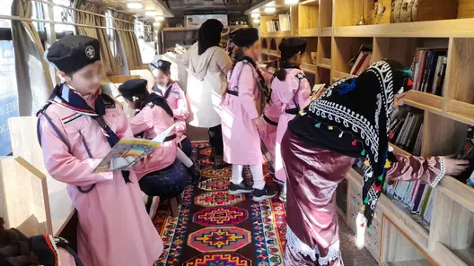 Girls reading in the bus