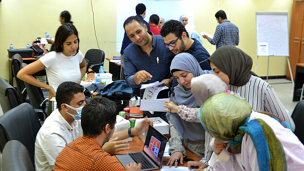 Students discussing their tasks during the workshop