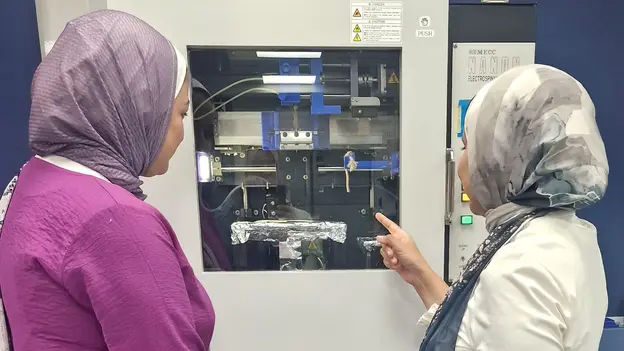AGYA Alumna Maha Nasr with colleague at laboratory; Healing Wounds Smarter Project 2