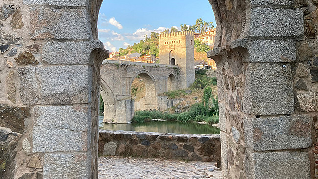 Photo of the Puente de San Martin stone bridge in Toledo