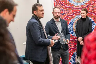 Stefan Maneval and Amro Ali presenting exhibition catalogue